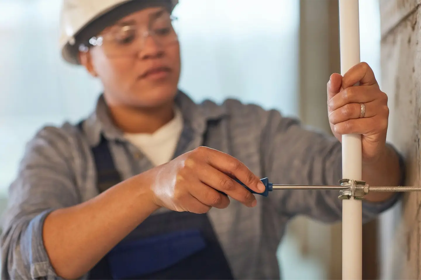 Female plumber working